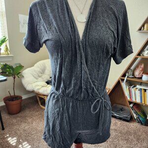 Comfy stretchy romper with pockets.